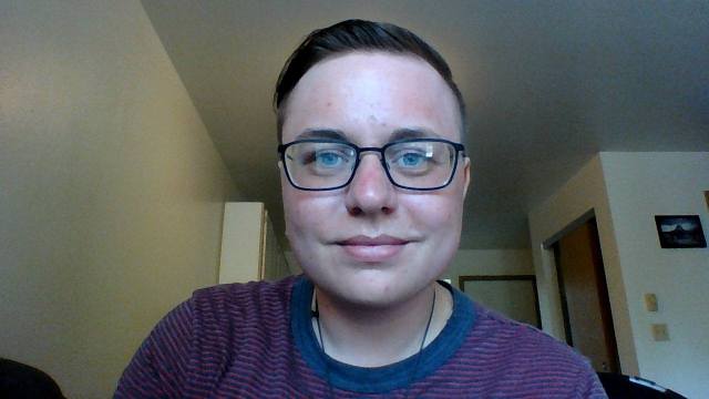 A photo of Dan from the shoulders up.